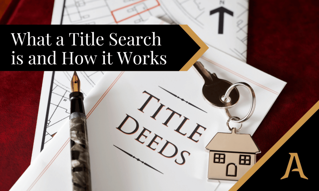 A title deed along with house keys on the desk of a title company performing a title search