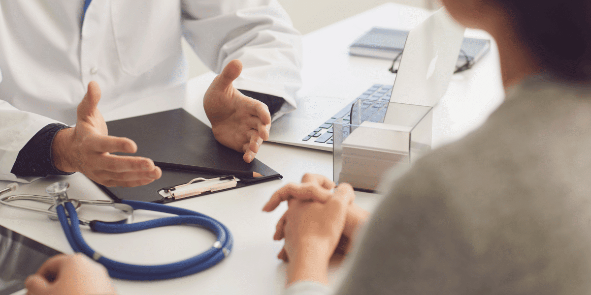 A physician speaking with the family of an incapacitated patient