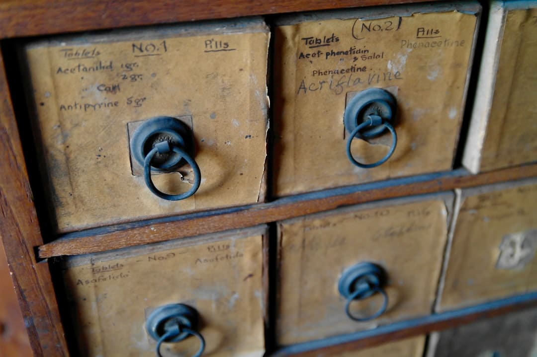 A set of house keys resting on a neat stack of official documents in a bright, professional setting, symbolizing a clear title and a successful closing.